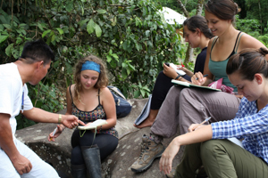 students taking notes in the field